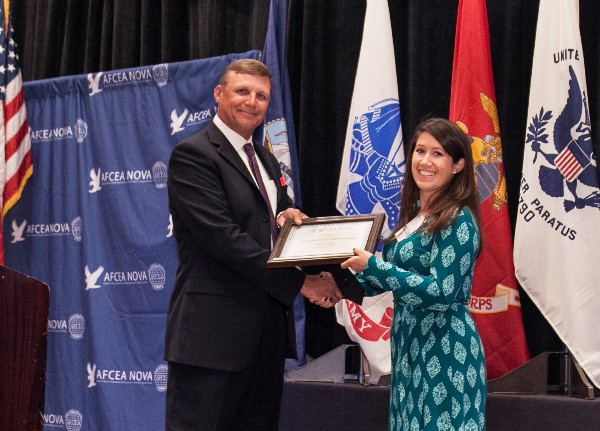 Sarah Williams receives the Emerging Young AFCEAN Award from Zich in September.